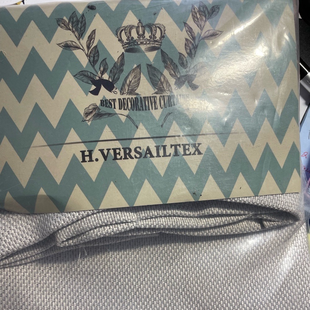 Taupe rod pocket curtain. 52x18